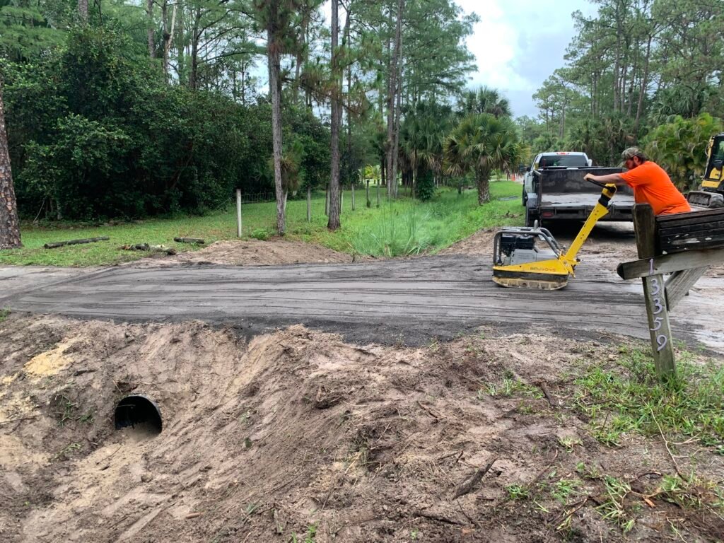 Drainage culvert trench excavator Palm Beach Florida
