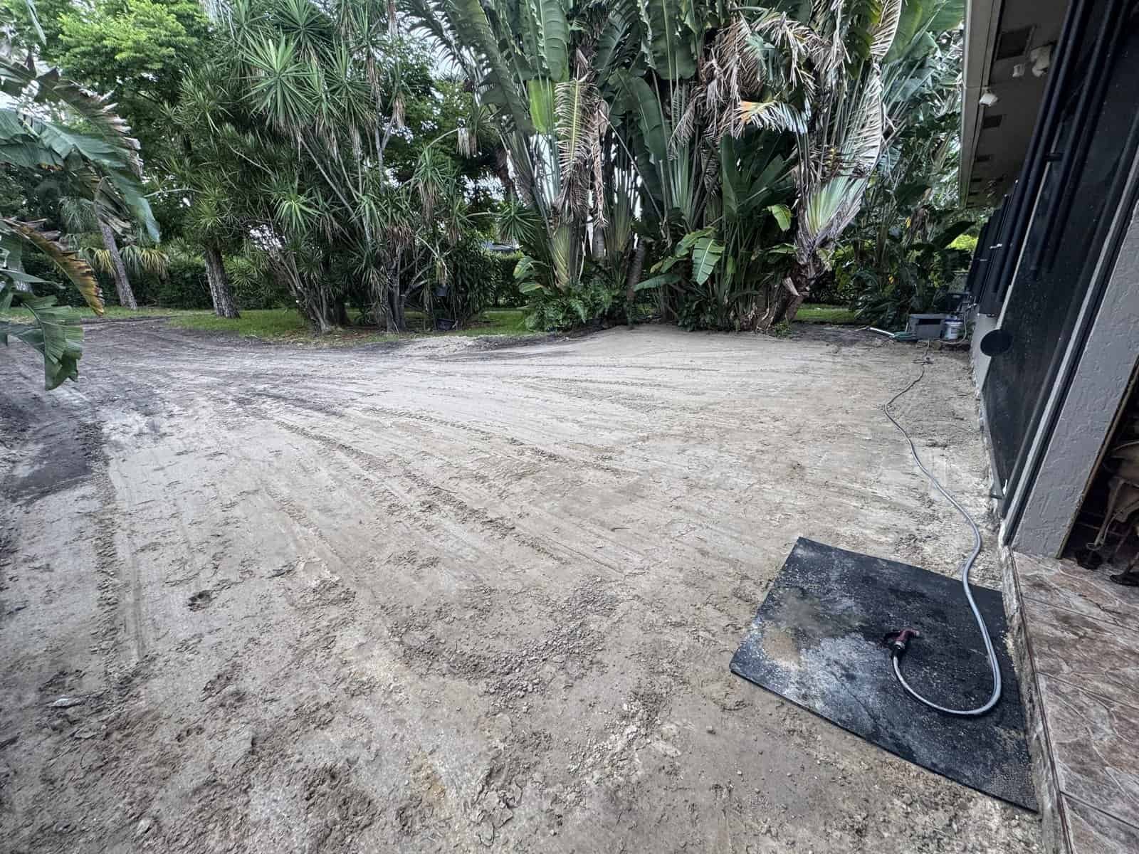 Backfilled and graded yard after swimming pool removal in Royal Palm Beach, FL, ready for sod