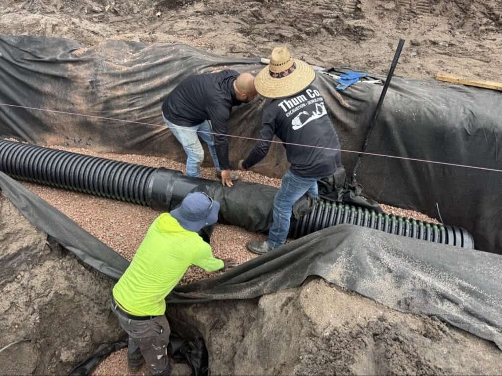Perforated HDPE pipe installed in exfiltration trench Tequesta FL