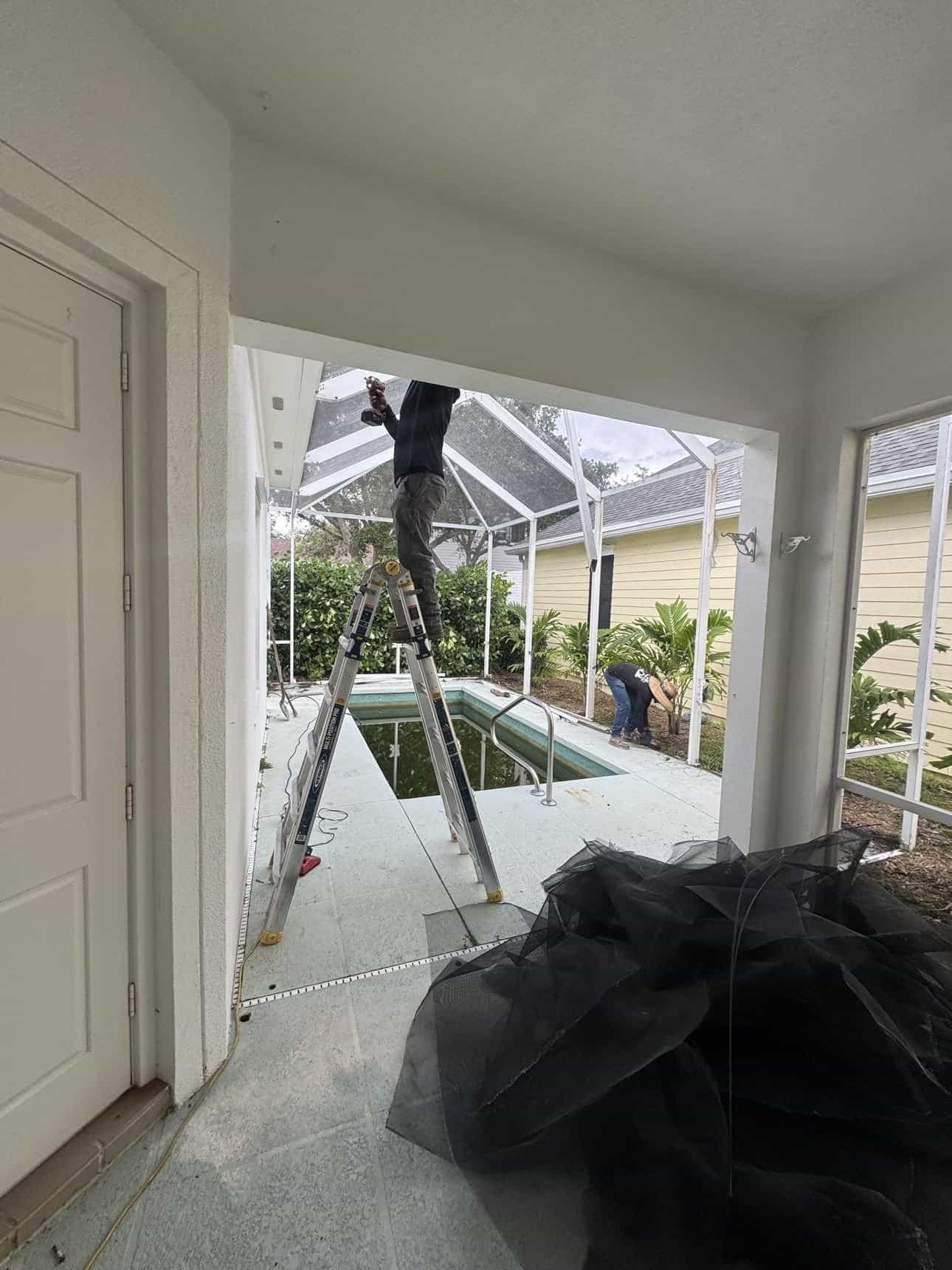 Pool screen enclosure removal before pool demolition Jupiter FL