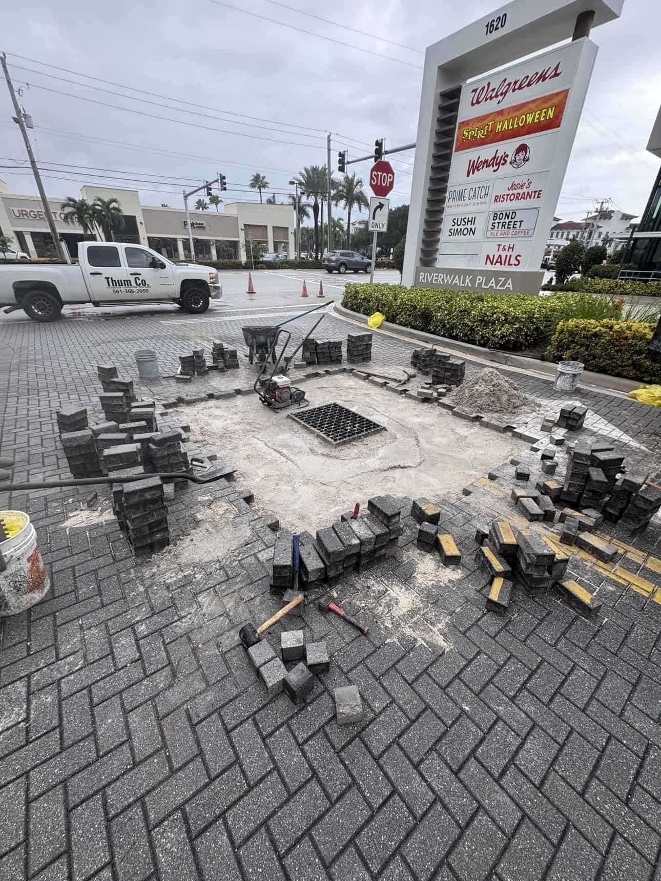Storm drain catch basin exposed at Riverwalk Plaza Boynton Beach