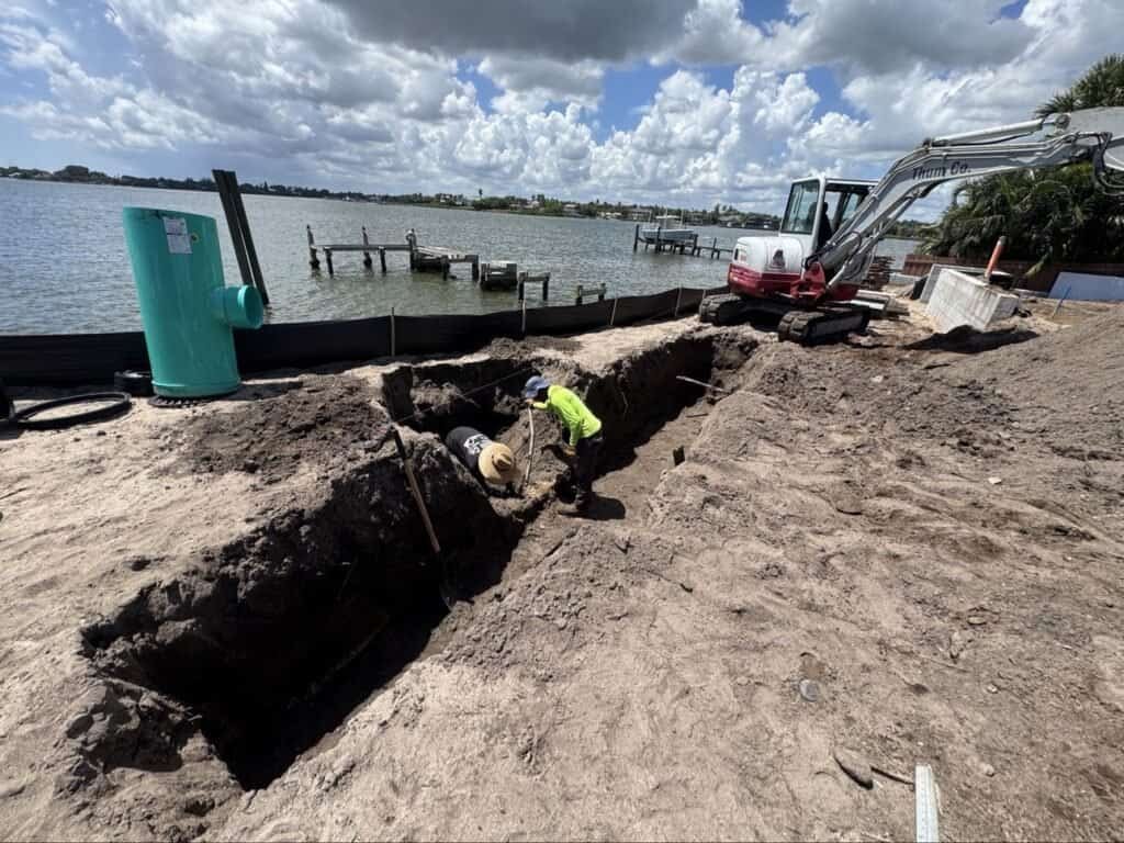 Storm drain exfiltration trench excavation in Tequesta FL